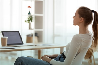 Woman meditating at work